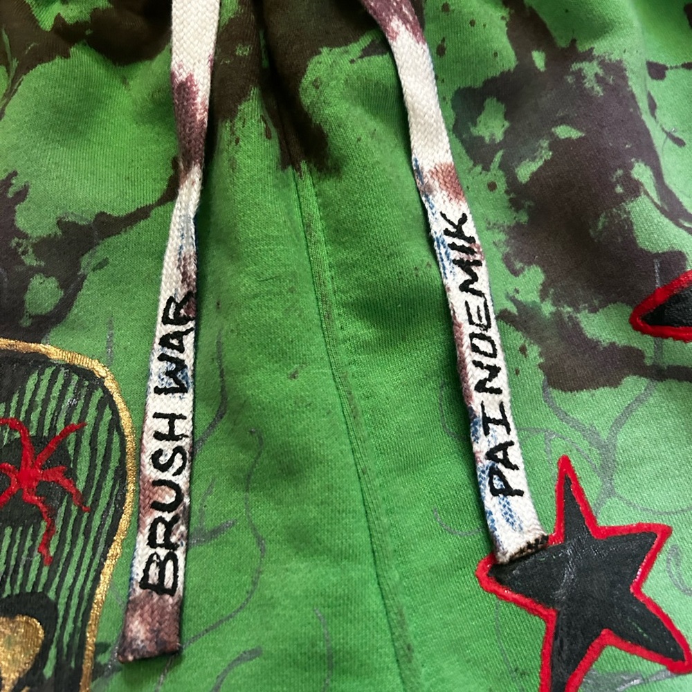 Green custom painted sweat shorts PAINDEMIK brand